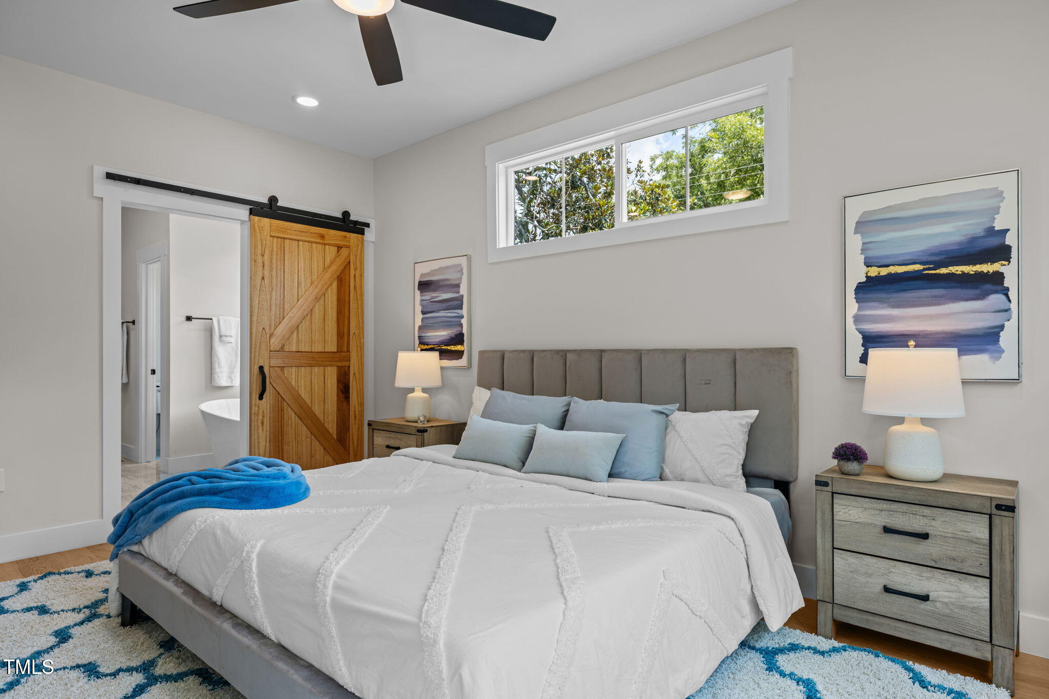 121 West Braxton Foushee Street Carrboro, NC 27510 - Photo 18 of 50 a bedroom with a bed and a window