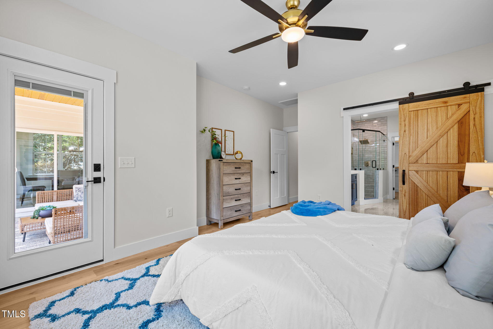 121 West Braxton Foushee Street Carrboro, NC 27510 - Photo 19 of 50 a bedroom with a bed and a window