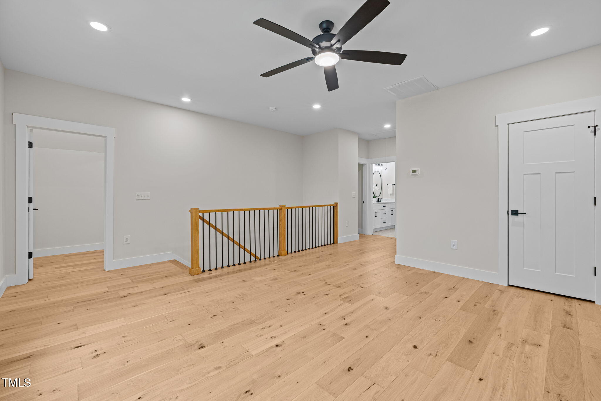 121 West Braxton Foushee Street Carrboro, NC 27510 - Photo 25 of 50 an empty room with fan and a ceiling fan