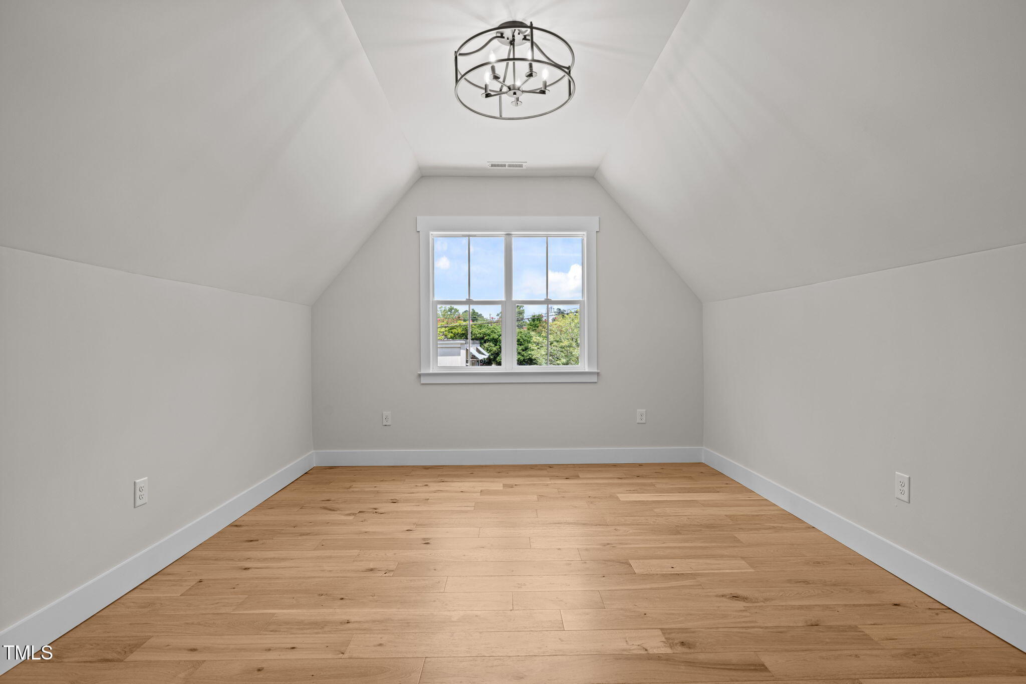 121 West Braxton Foushee Street Carrboro, NC 27510 - Photo 28 of 50 an empty room with a window