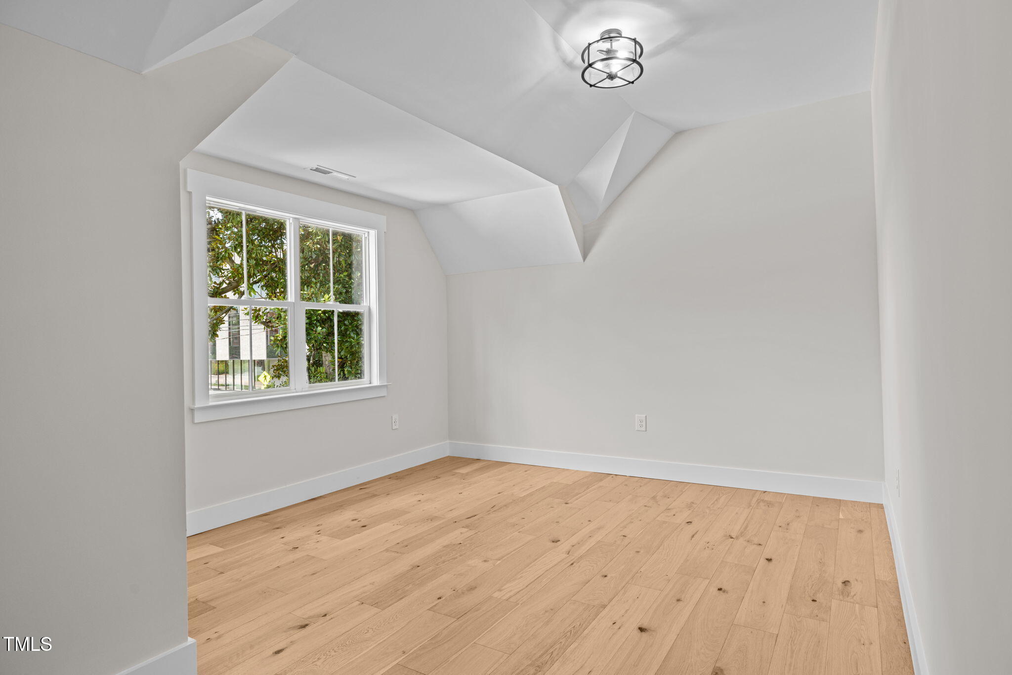 121 West Braxton Foushee Street Carrboro, NC 27510 - Photo 34 of 50 an empty room with a window
