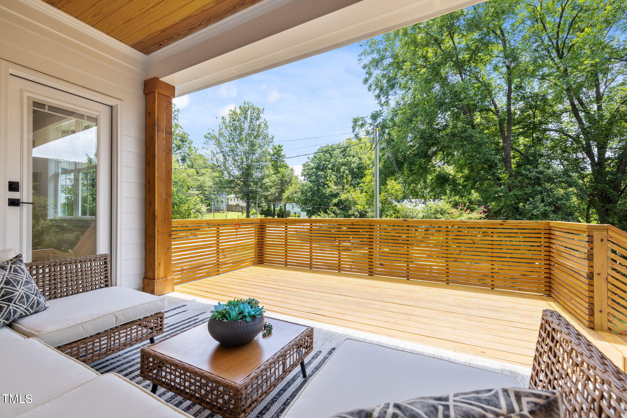 121 West Braxton Foushee Street Carrboro, NC 27510 - Photo 37 of 50 a balcony with table and chairs