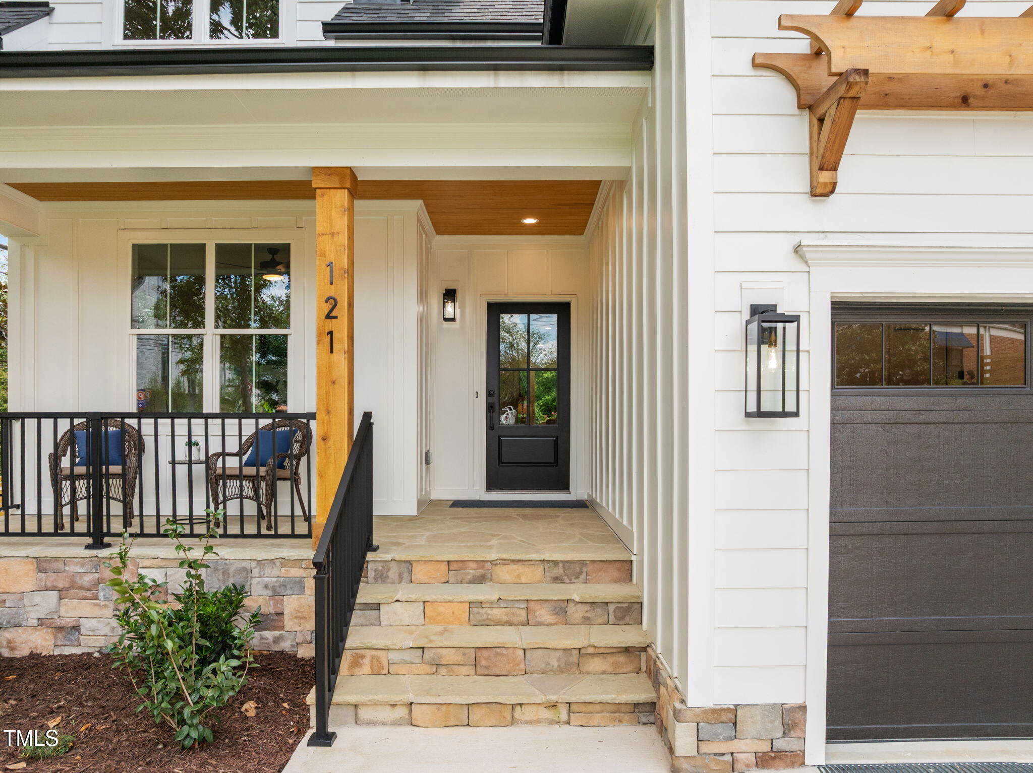 121 West Braxton Foushee Street Carrboro, NC 27510 - Photo 2 of 50 a front view of a house with a porch