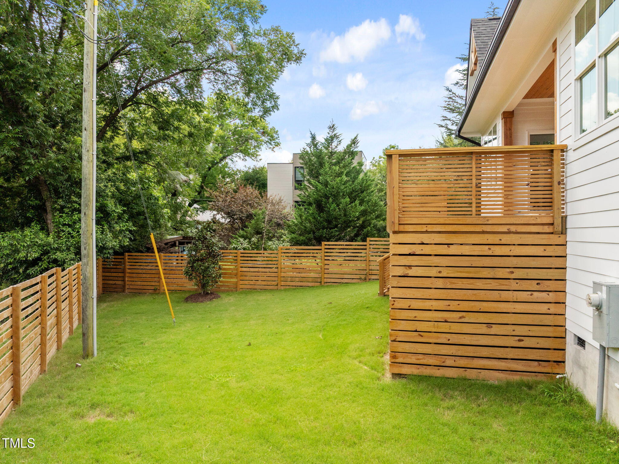 121 West Braxton Foushee Street Carrboro, NC 27510 - Photo 40 of 50 a view of a backyard with plants and a patio
