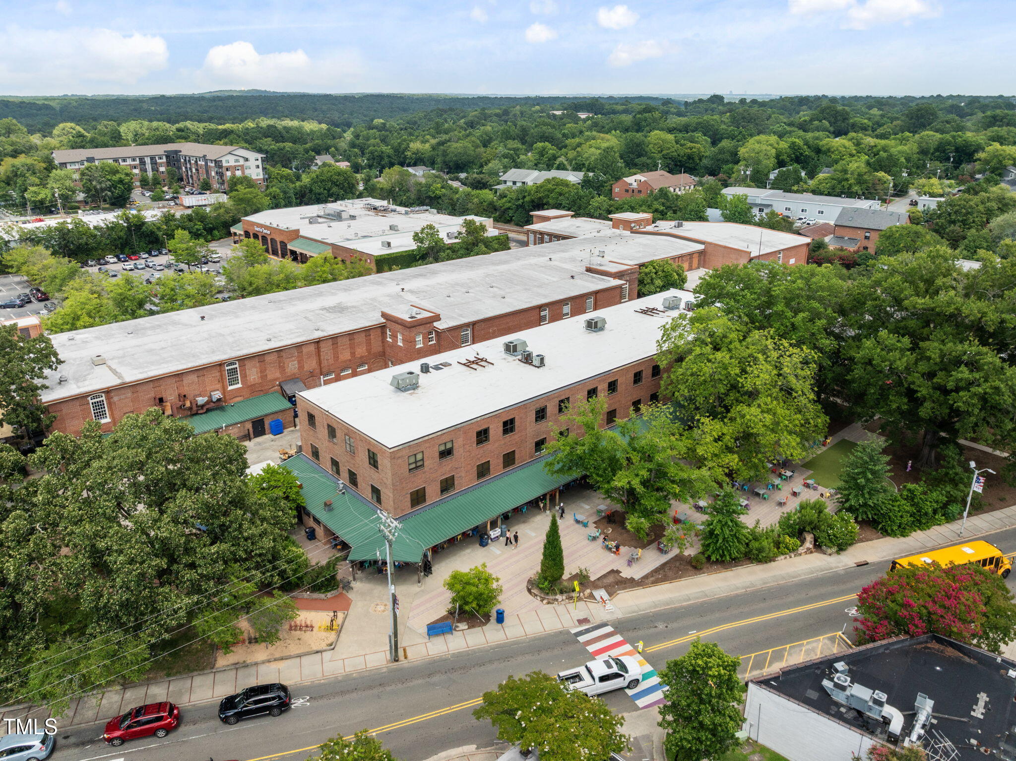 121 West Braxton Foushee Street Carrboro, NC 27510 - Photo 45 of 50 an aerial view of a house with a garden and mountain view in back