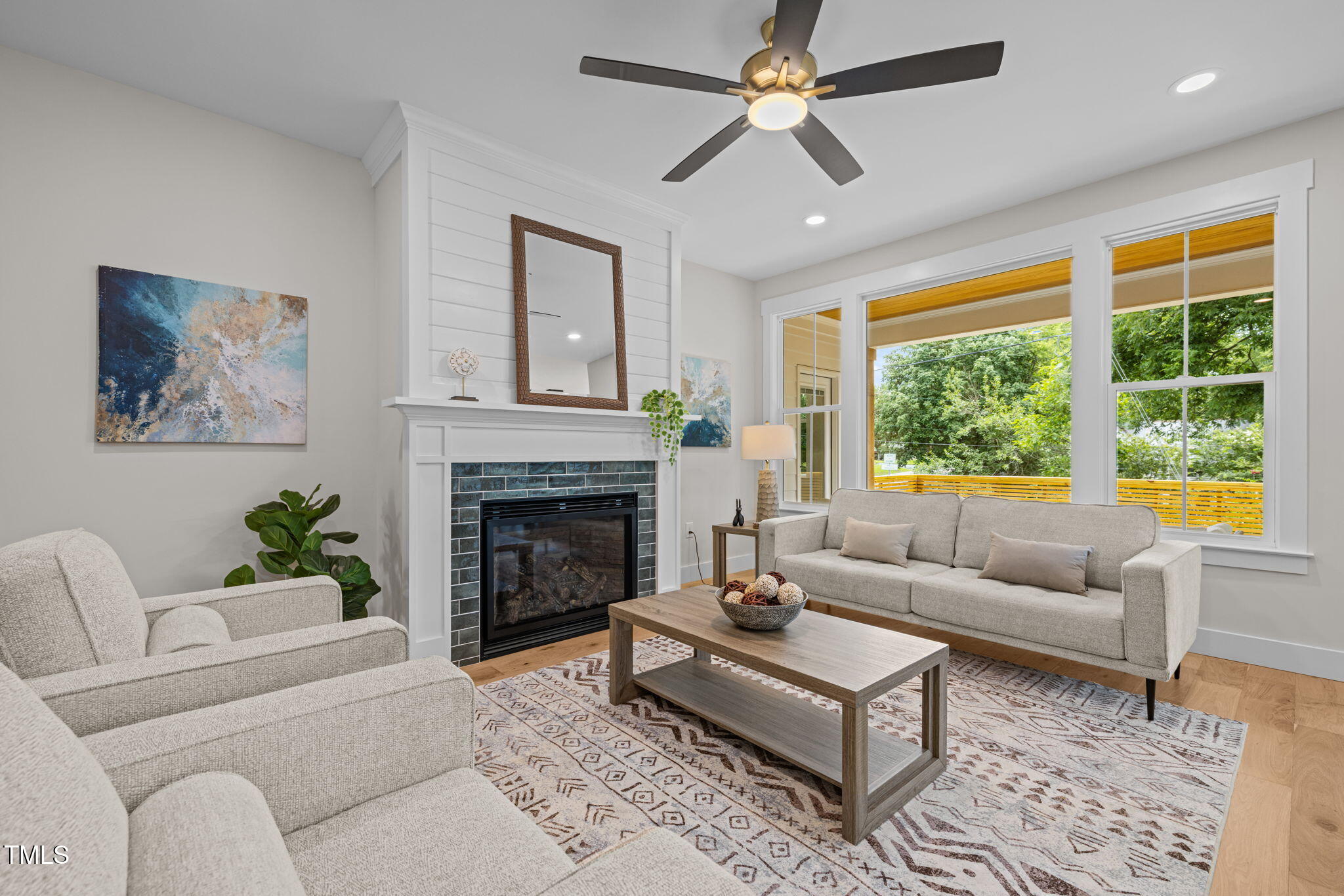121 West Braxton Foushee Street Carrboro, NC 27510 - Photo 6 of 50 a living room with furniture and a fireplace
