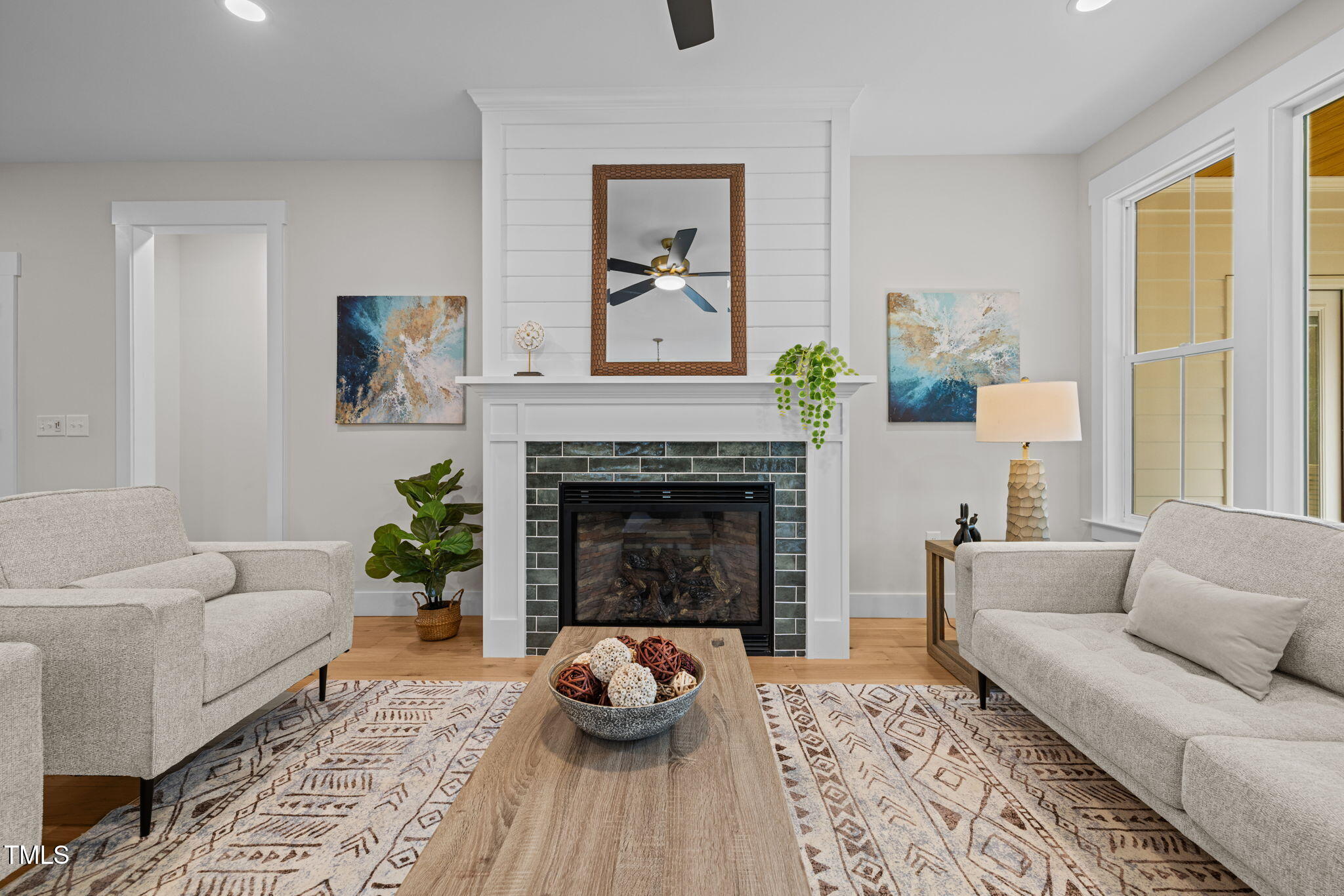 121 West Braxton Foushee Street Carrboro, NC 27510 - Photo 7 of 50 a living room with furniture and a fireplace