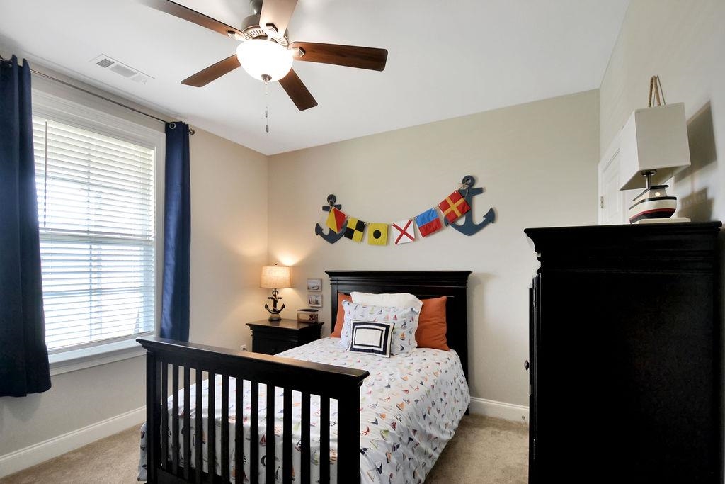 70 Trinity Cove Atoka, TN 38004 - Photo 12 of 20 a bedroom with bed and a window