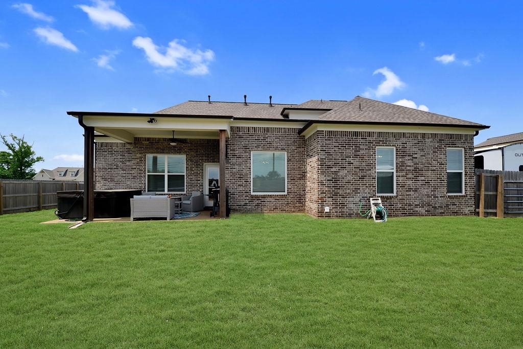 70 Trinity Cove Atoka, TN 38004 - Photo 17 of 20 a view of a house with a yard