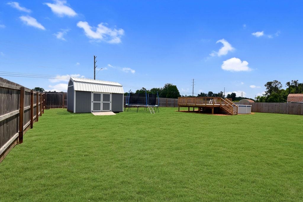 70 Trinity Cove Atoka, TN 38004 - Photo 18 of 20 a front view of a house with garden