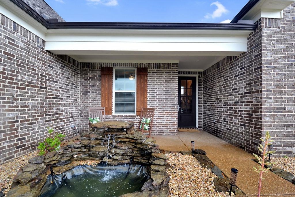 70 Trinity Cove Atoka, TN 38004 - Photo 20 of 20 a front view of a house with a yard