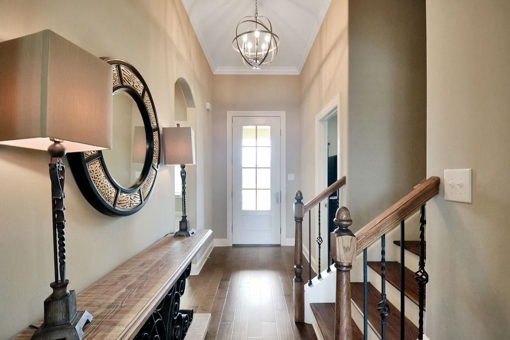 70 Trinity Cove Atoka, TN 38004 - Photo 2 of 20 a view of a hallway with wooden floor and entryway