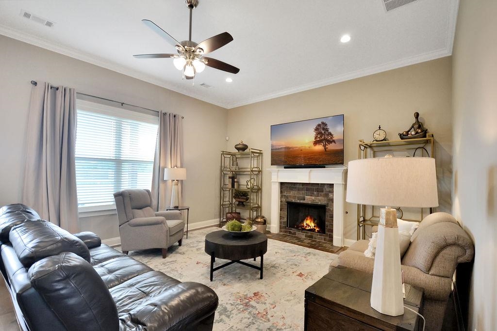 70 Trinity Cove Atoka, TN 38004 - Photo 3 of 20 a living room with furniture fireplace and a flat screen tv