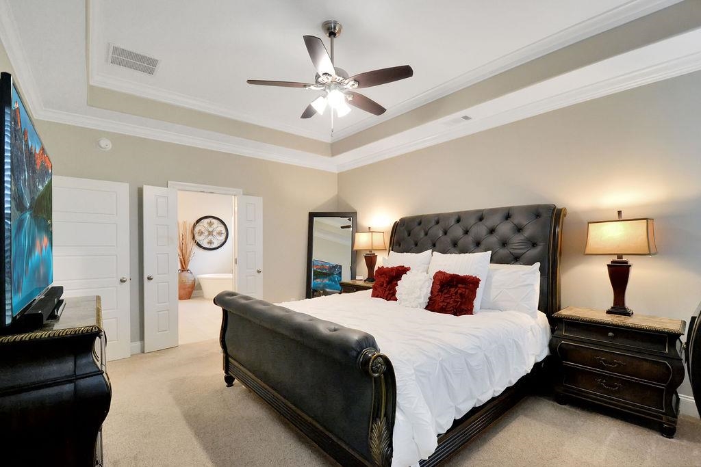 70 Trinity Cove Atoka, TN 38004 - Photo 7 of 20 a bedroom with a bed and a lamp