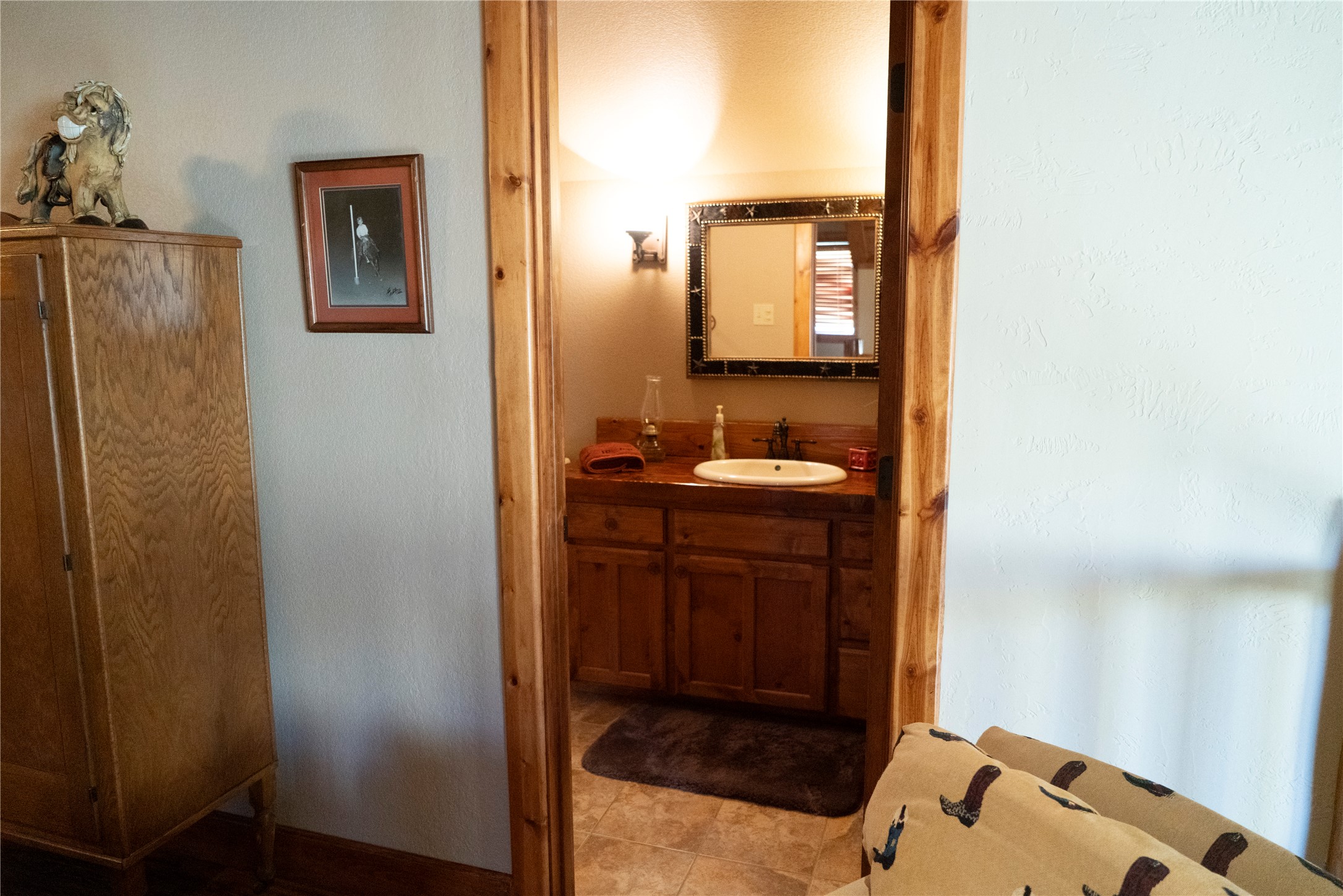 298 Cr 346 Road Milano, TX 76556 - Photo 17 of 26 a bathroom with a sink and a mirror