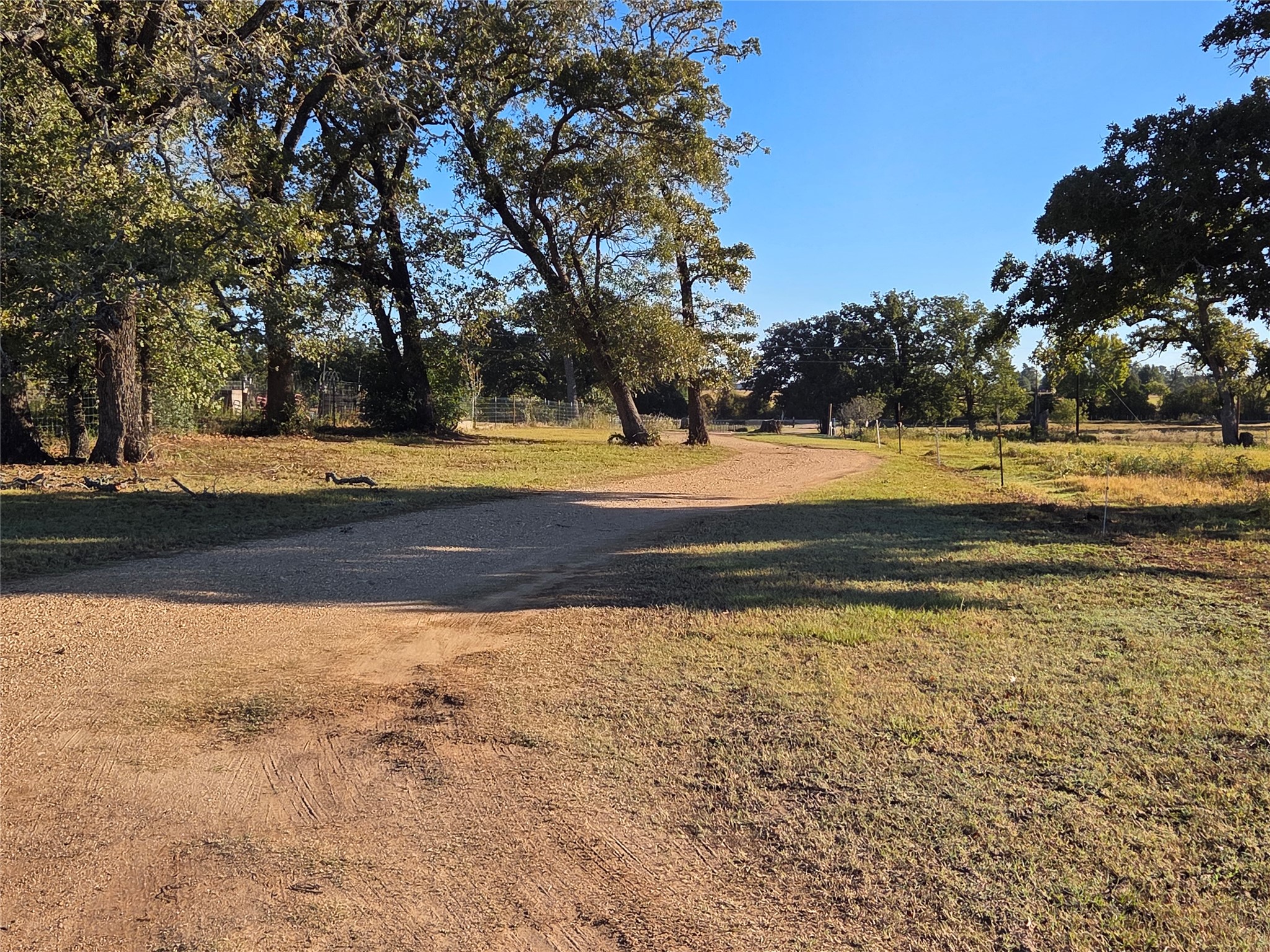298 Cr 346 Road Milano, TX 76556 - Photo 23 of 26 a view of a swimming pool with an outdoor space and seating area