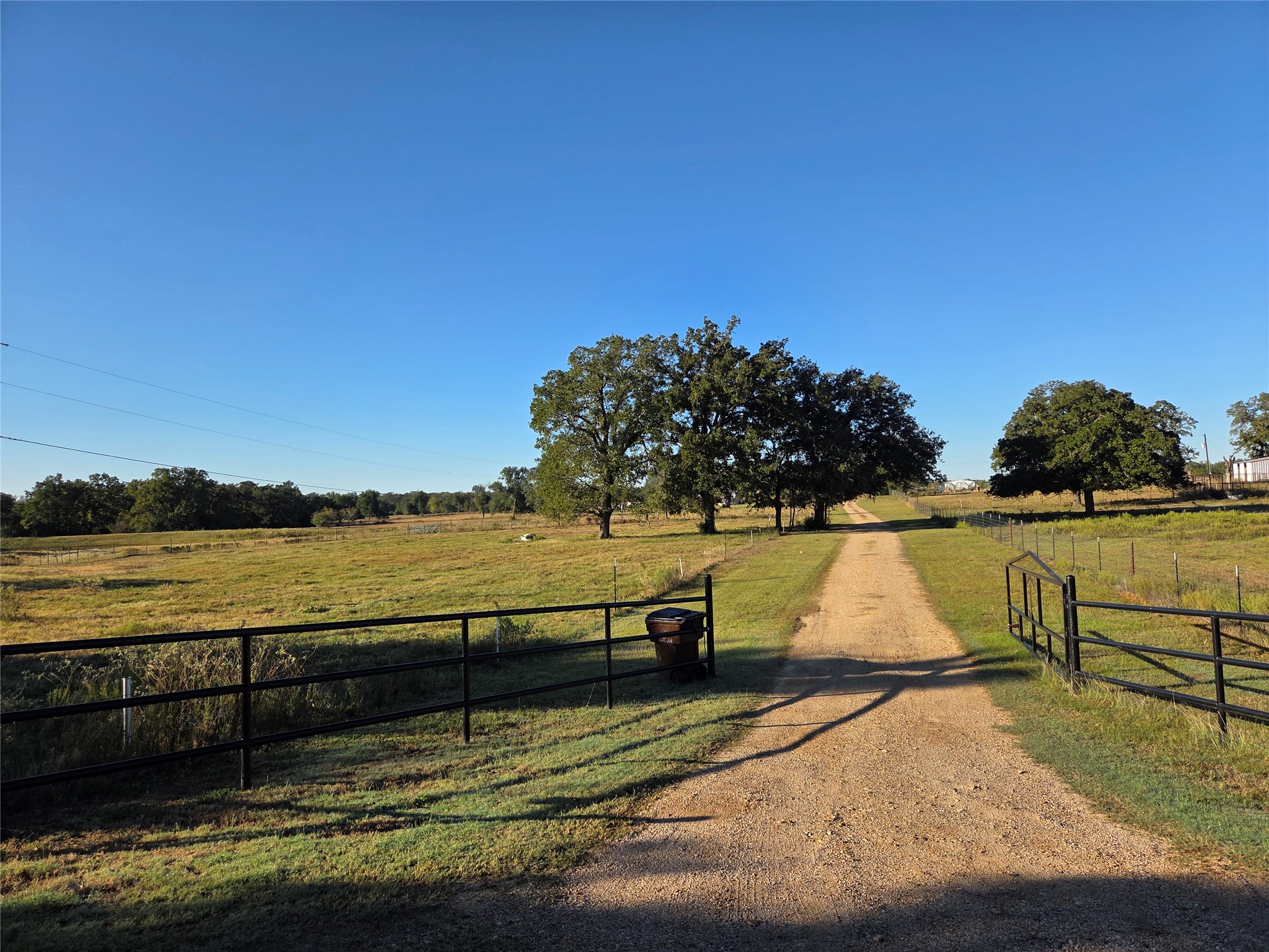 298 Cr 346 Road Milano, TX 76556 - Photo 24 of 26 a view of a lake from a yard