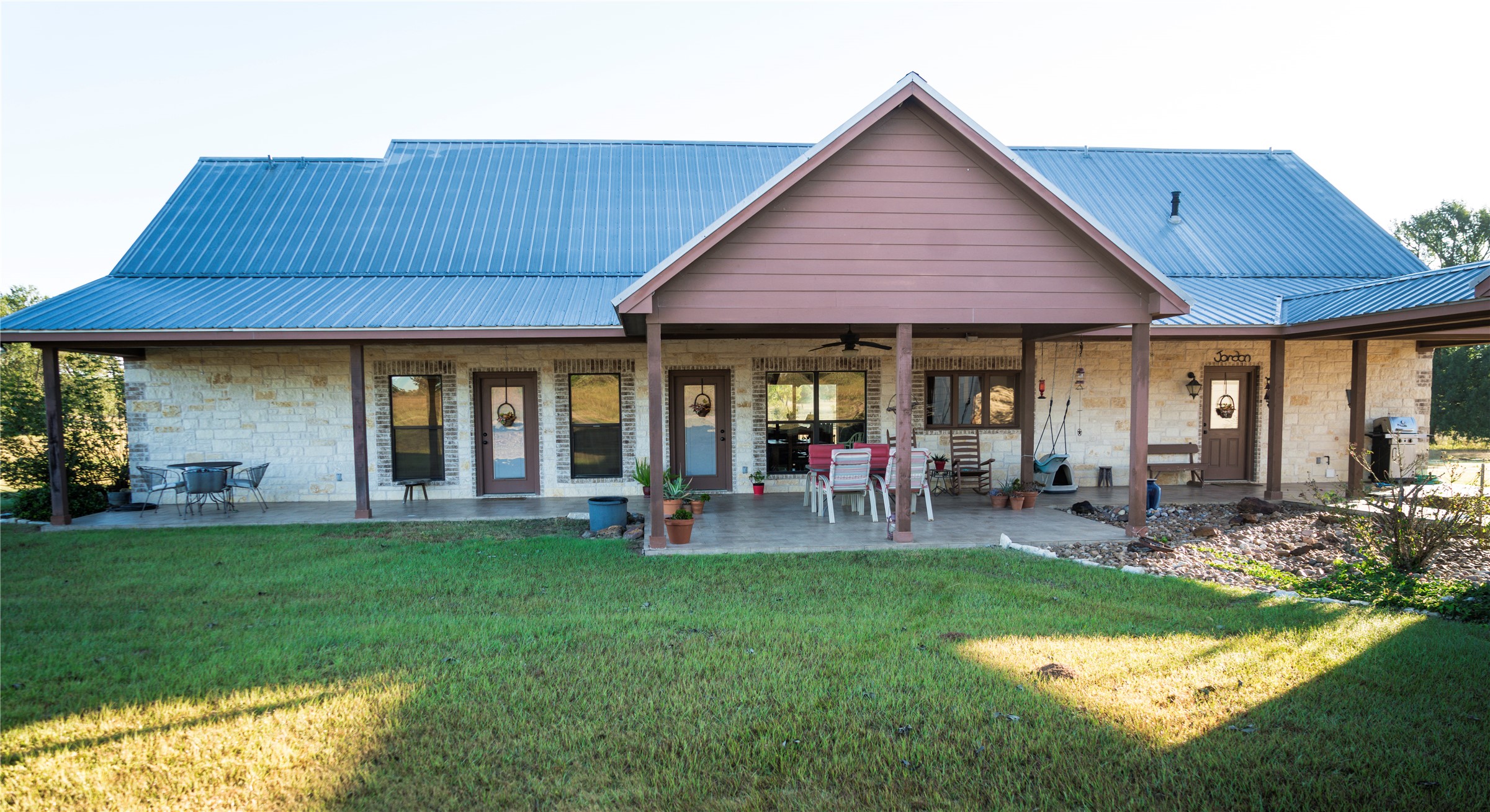 298 Cr 346 Road Milano, TX 76556 - Photo 3 of 26 a front view of house with a garden and patio