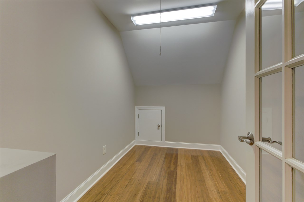 422 Heather Drive Raleigh, NC 27606 - Photo 27 of 30 Storage Room with attic and eaves access. Storage Room
