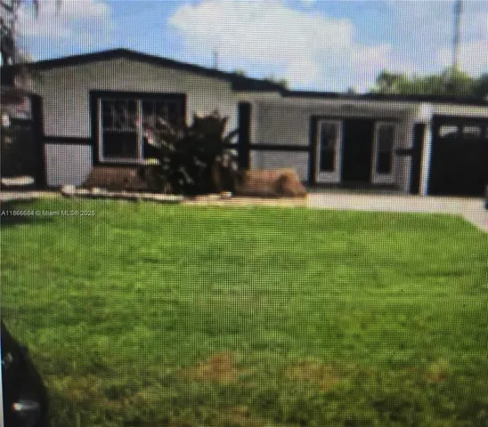 a front view of house with yard