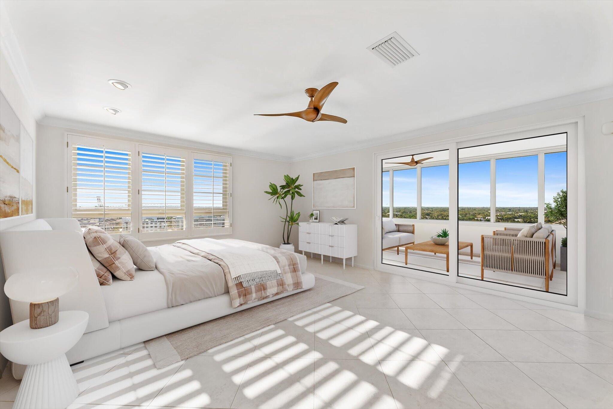 50 E Road, Unit 12A Delray Beach, FL 33483 - Photo 10 of 47 a spacious bedroom with a large bed and a large window