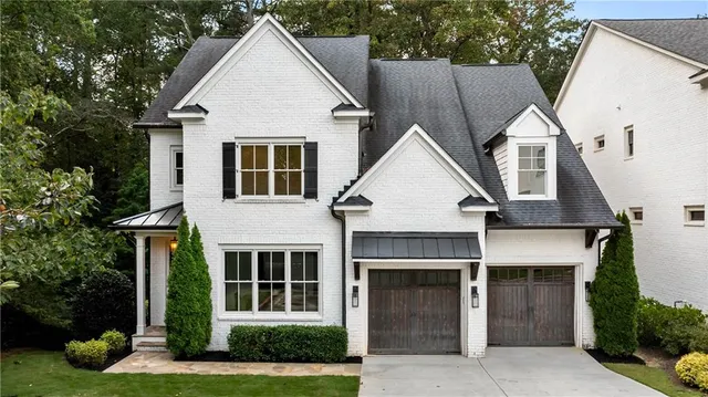 a view of house with garden