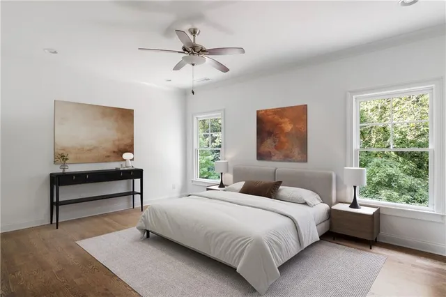 a bedroom with a bed and window