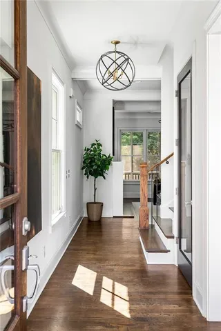 a view of entryway with wooden floor