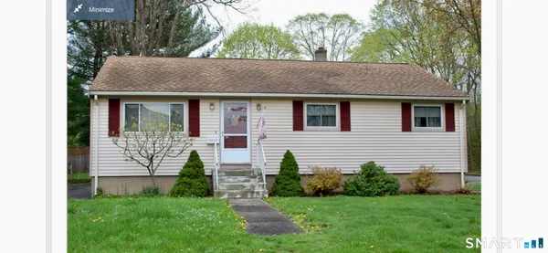 a front view of house with yard