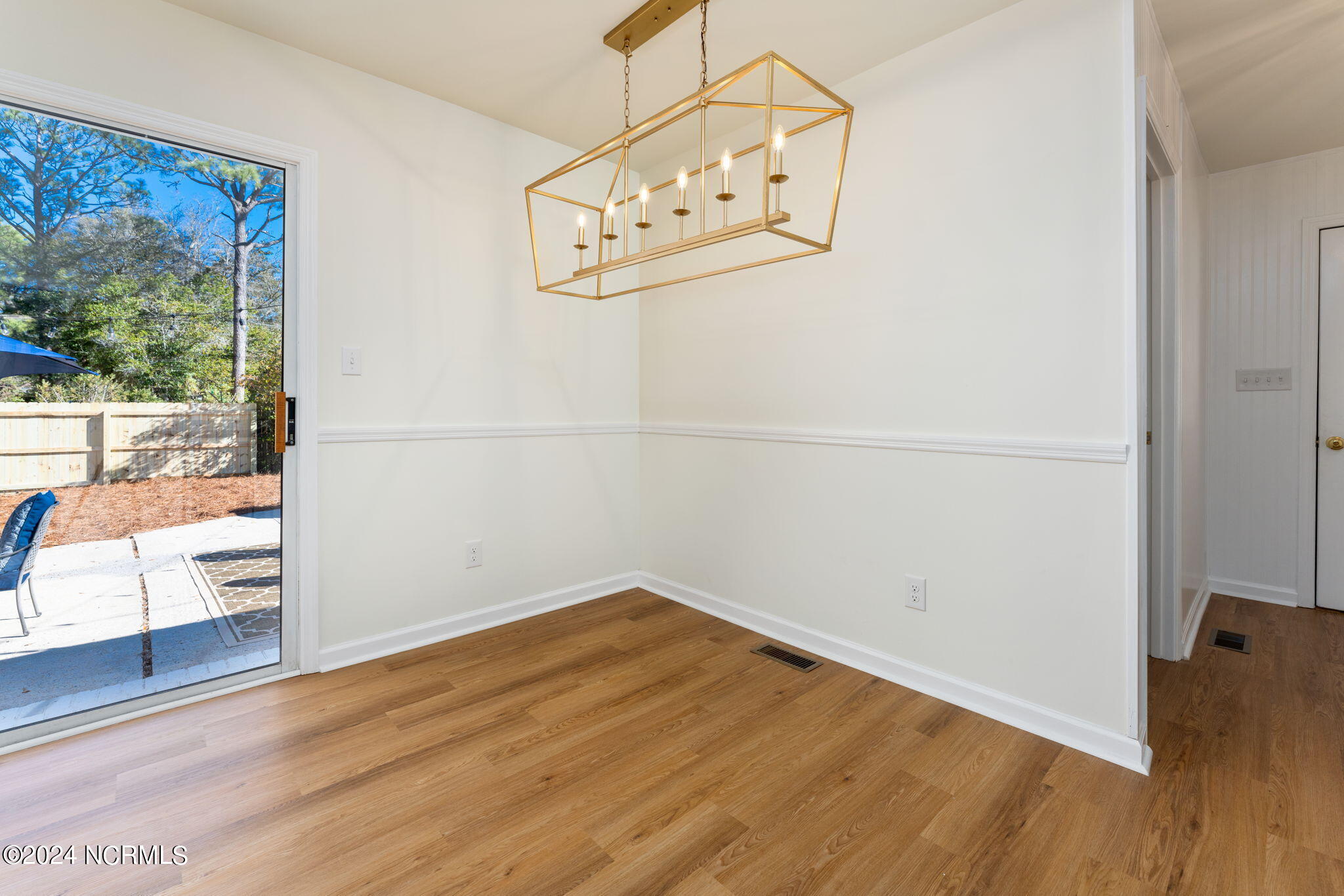 229 2 Chopt Road Wilmington, NC 28405 - Photo 31 of 73 Dinner with a view! Gorgeous carriage chandelier