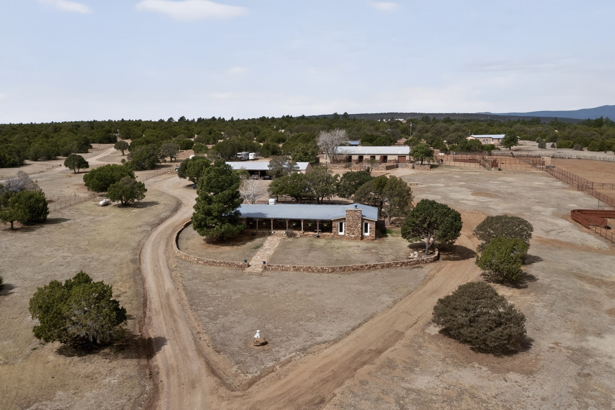 60 Blue Sky Road Las Vegas, NM 87701 - Photo 42 of 92 Ranch manager's house with barns and stables behind