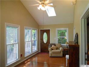 3932 Lake Shore Road South Denver, NC 28037 - Photo 11 of 16 a living room with furniture and a large window