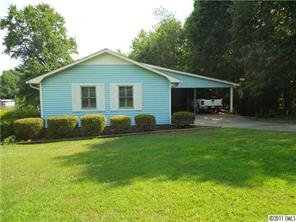 3932 Lake Shore Road South Denver, NC 28037 - Photo 2 of 16 a front view of house with yard and green space