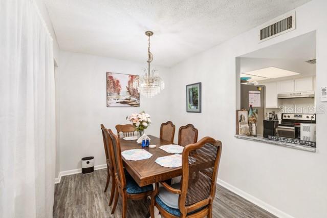 631 Silver Pass, Unit A Ocala, FL 34472 - Photo 17 of 47 a dining room with furniture and window