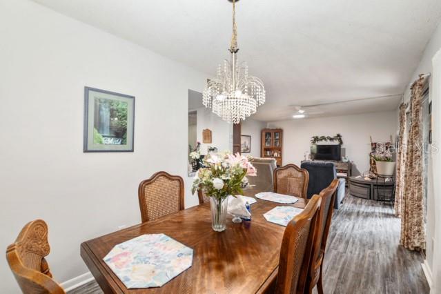 631 Silver Pass, Unit A Ocala, FL 34472 - Photo 18 of 47 a dining room with furniture and window