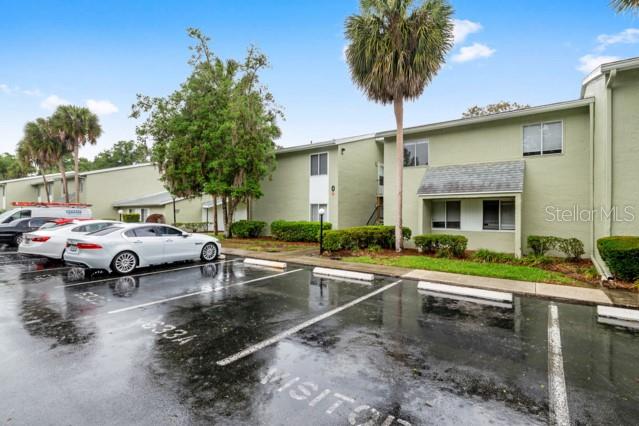 631 Silver Pass, Unit A Ocala, FL 34472 - Photo 2 of 47 a view of a swimming pool with a lounge chairs
