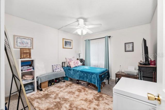631 Silver Pass, Unit A Ocala, FL 34472 - Photo 25 of 47 a living room with furniture and a table