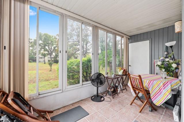 631 Silver Pass, Unit A Ocala, FL 34472 - Photo 35 of 47 a living room with furniture and a window