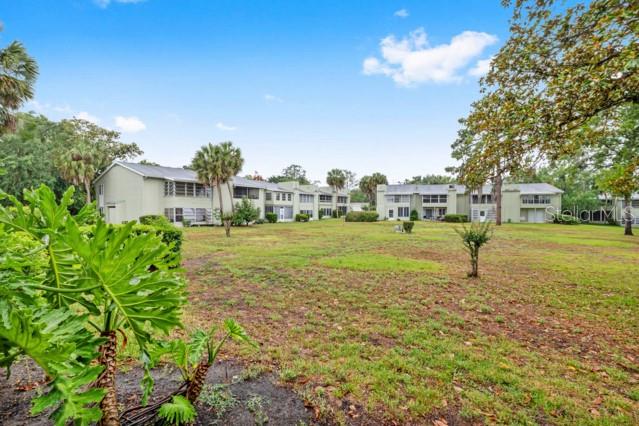 631 Silver Pass, Unit A Ocala, FL 34472 - Photo 42 of 47 a view of outdoor space with garden view
