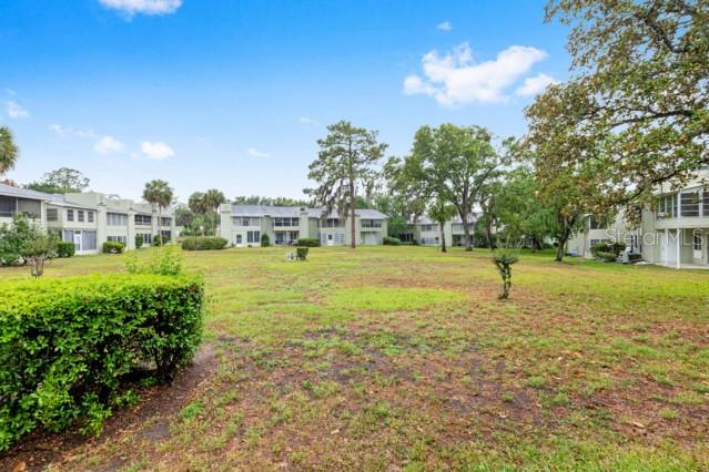 631 Silver Pass, Unit A Ocala, FL 34472 - Photo 43 of 47 a view of a fountain in front of a house