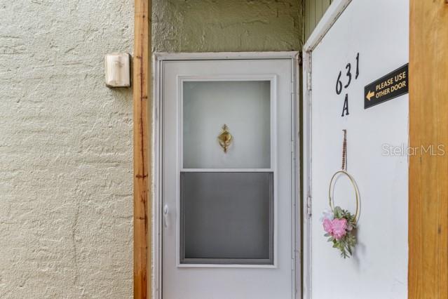 631 Silver Pass, Unit A Ocala, FL 34472 - Photo 8 of 47 a close view of door with shower