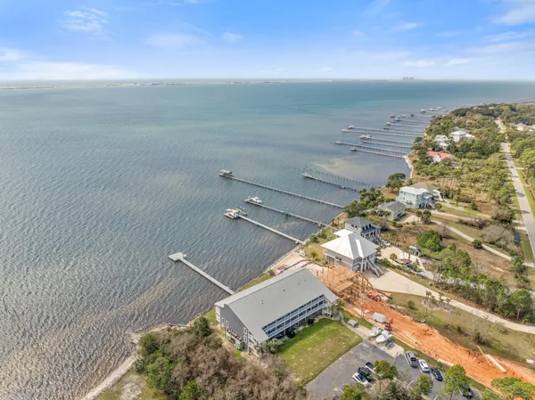 a view of balcony with wooden floor