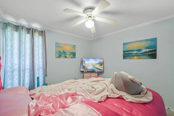 a view of a building with a yard