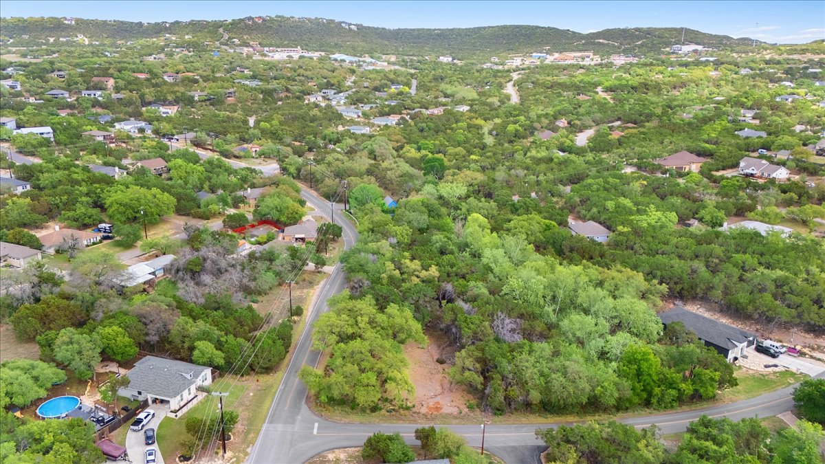 20404 Ridgeview Road Leander, TX 78645 - Photo 6 of 26 a view of a city with lush green forest
