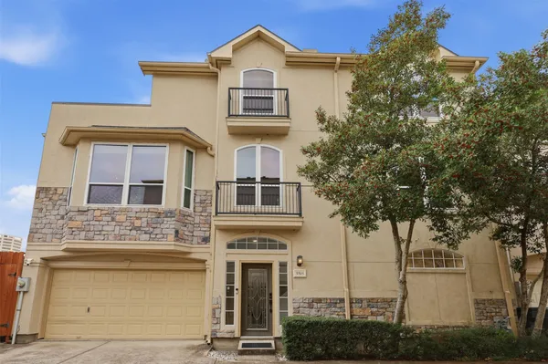 front view of a house with a street