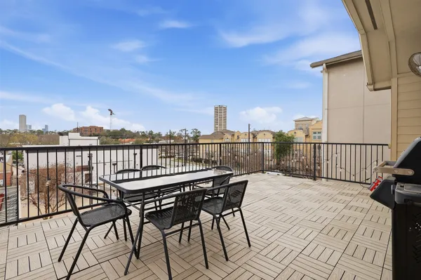 a view of a terrace with chairs