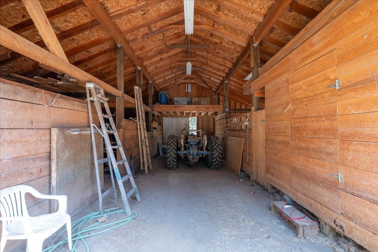 38090 Wortham Road Oakhurst, CA 93644 - Photo 45 of 54 a view of empty room with wooden stairs