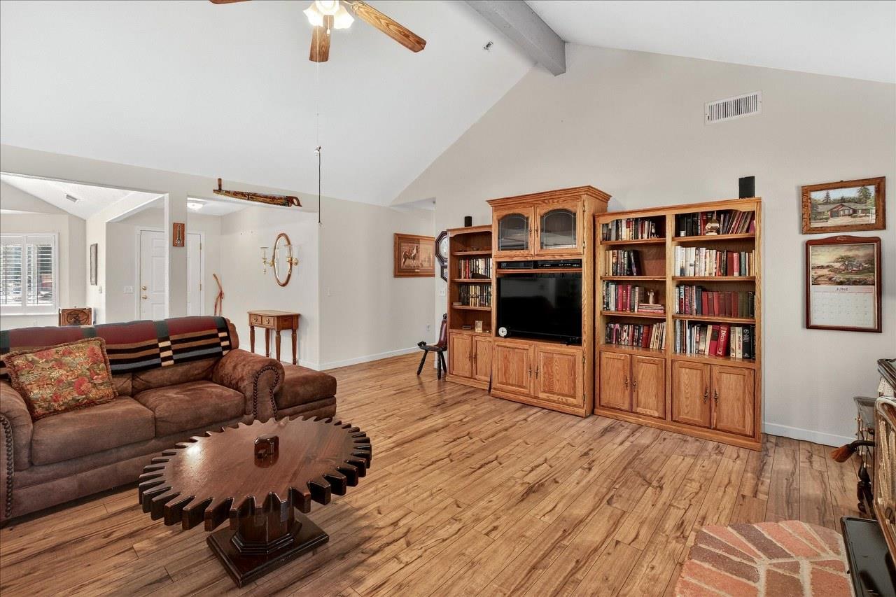 38090 Wortham Road Oakhurst, CA 93644 - Photo 8 of 54 a living room with furniture and wooden floor