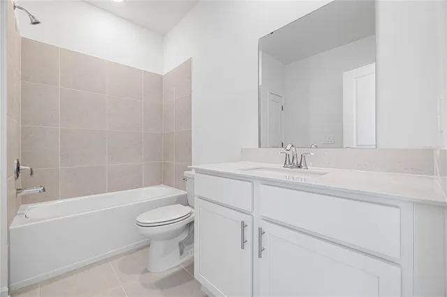 a bathroom with a sink a toilet and a bathtub