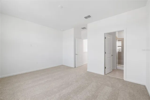 an empty room with an entryway